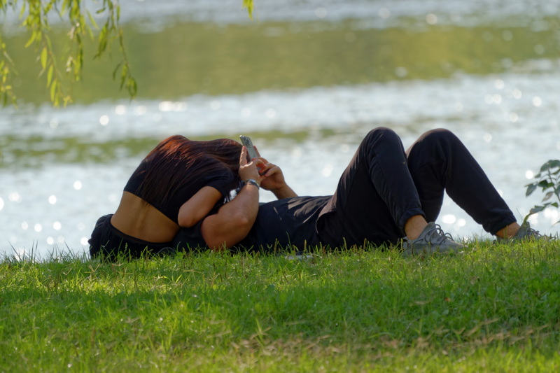 Couple on lake shore